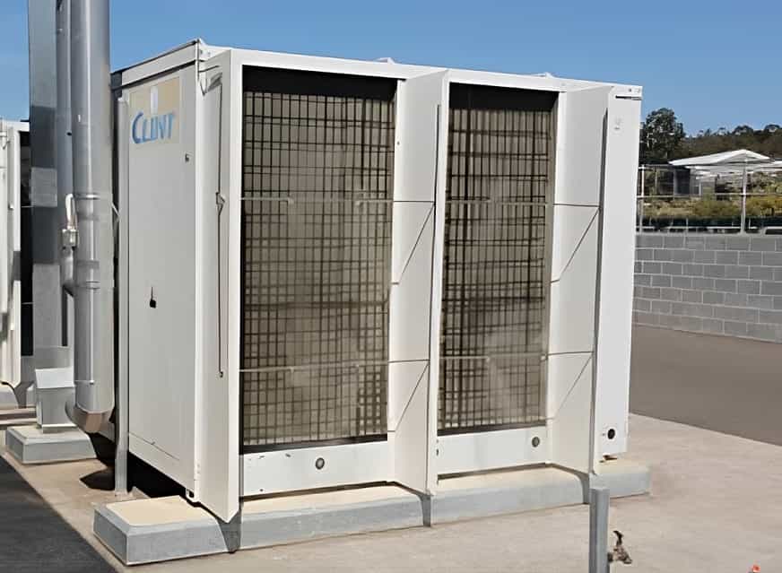 Pre-Cooling the air entering the coils of a commercial air-conditioner 			using a misting system